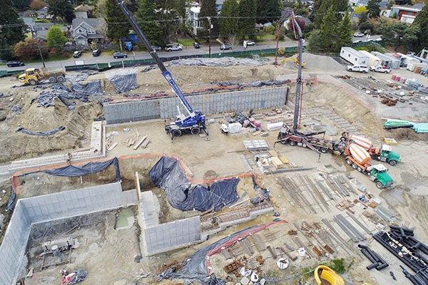 aerial view of a construction site with retaining walls