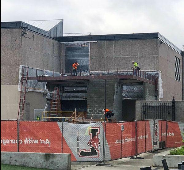 steel being installed in the outside corner of a building