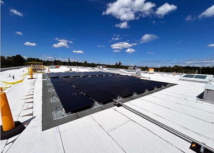 a roof with a very large solar panel